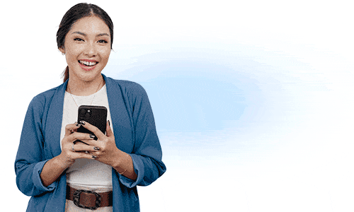 young-asian-woman-employee-with-happy-successful-expression-wearing-cardigan-holding-her-phone-isolated-by-white-background